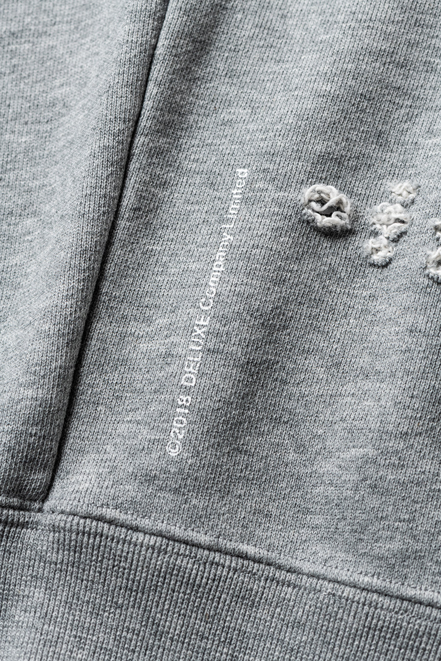 DELUXE x TIGHTBOOTH DAMAGE CREW SWEAT GRAY