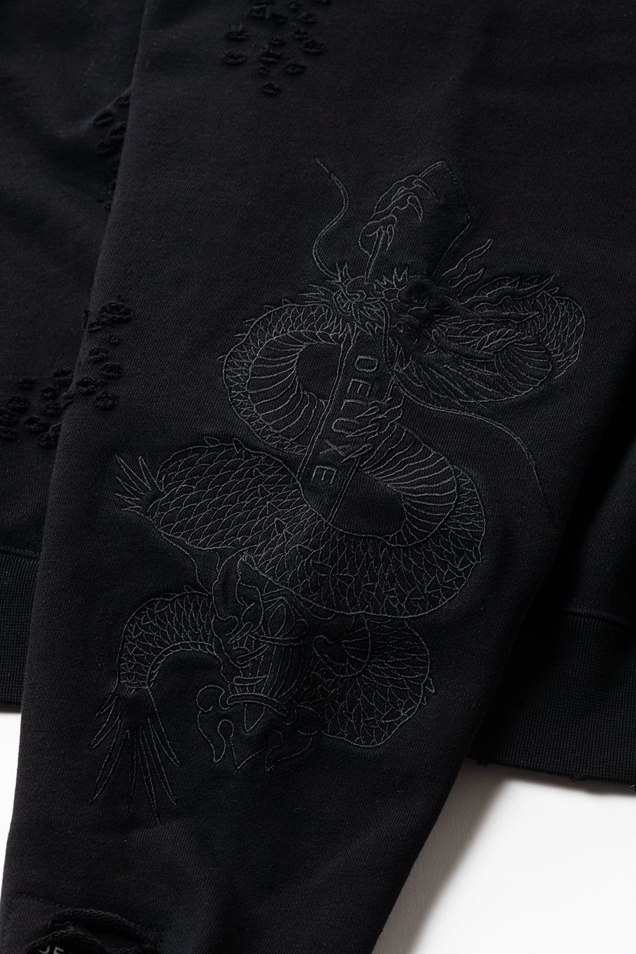 DELUXE x TIGHTBOOTH DAMAGE CREW SWEAT BLACK