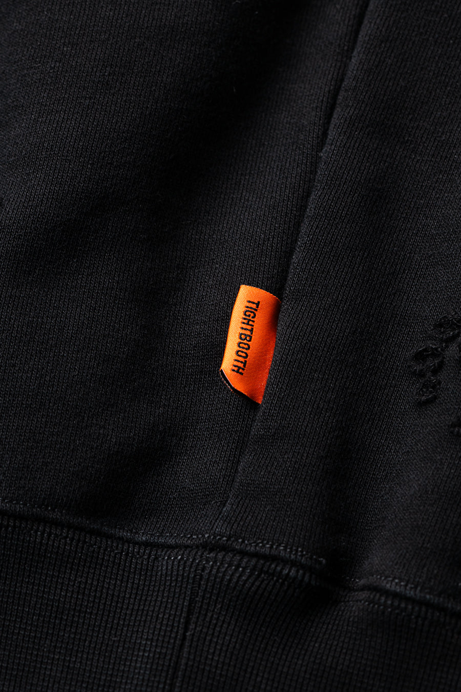 DELUXE x TIGHTBOOTH DAMAGE CREW SWEAT BLACK