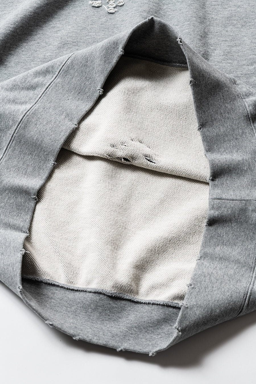 DELUXE x TIGHTBOOTH DAMAGE CREW SWEAT GRAY